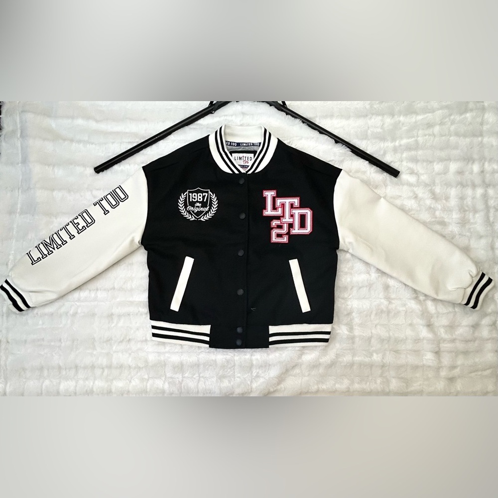 Black and White Varsity Jacket with Red Accents